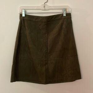 Green suede mini skirt